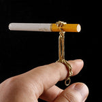 Anello con teschio in rame placcato oro e argento