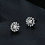 Orecchini a bottone rotondi in argento sterling con moissanite