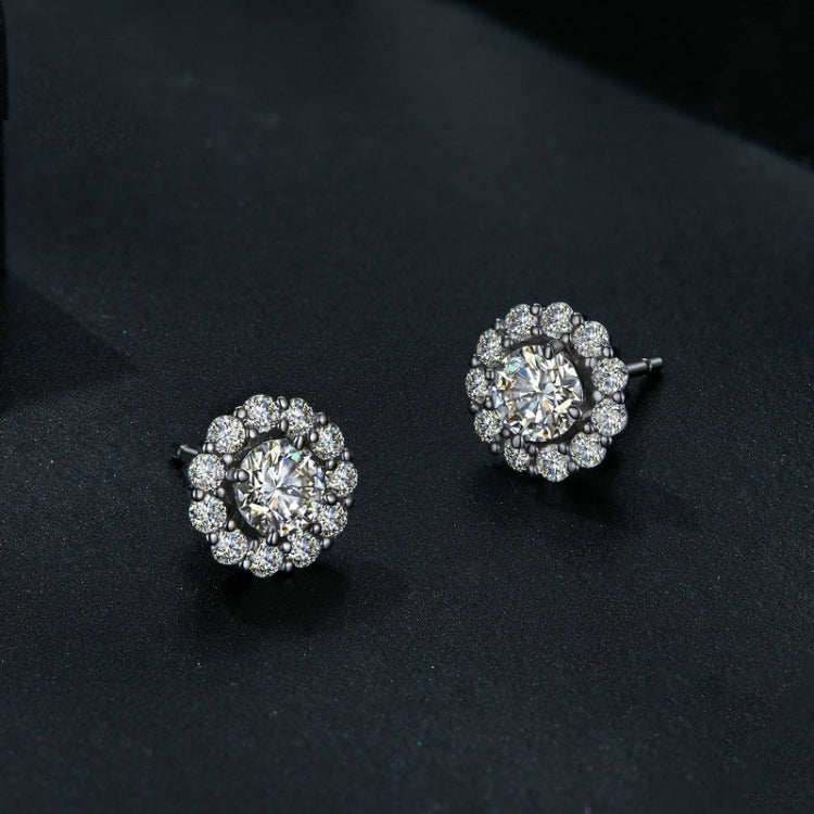Orecchini a bottone rotondi in argento sterling con moissanite