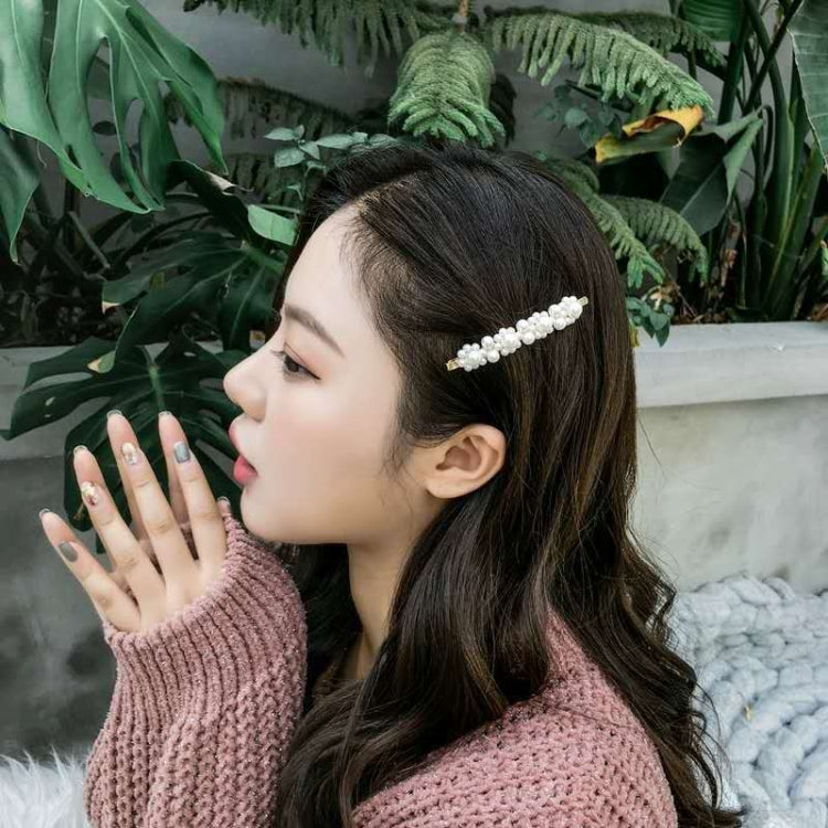 Set 5 fermagli per capelli con perle grandi