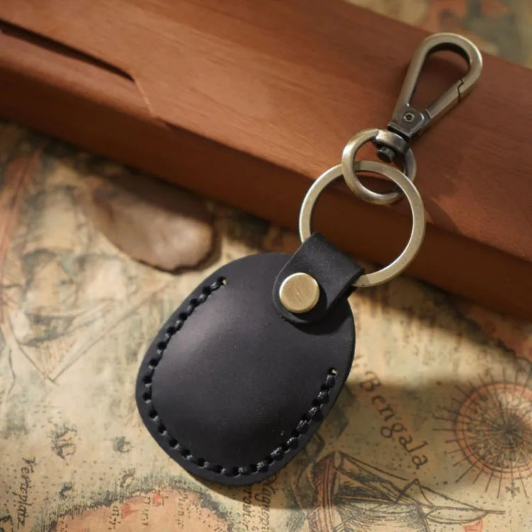 Custodia in pelle per AirTag con portachiavi