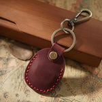 Custodia in pelle per AirTag con portachiavi