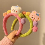 Fascia per capelli orso in peluche 24x20 cm