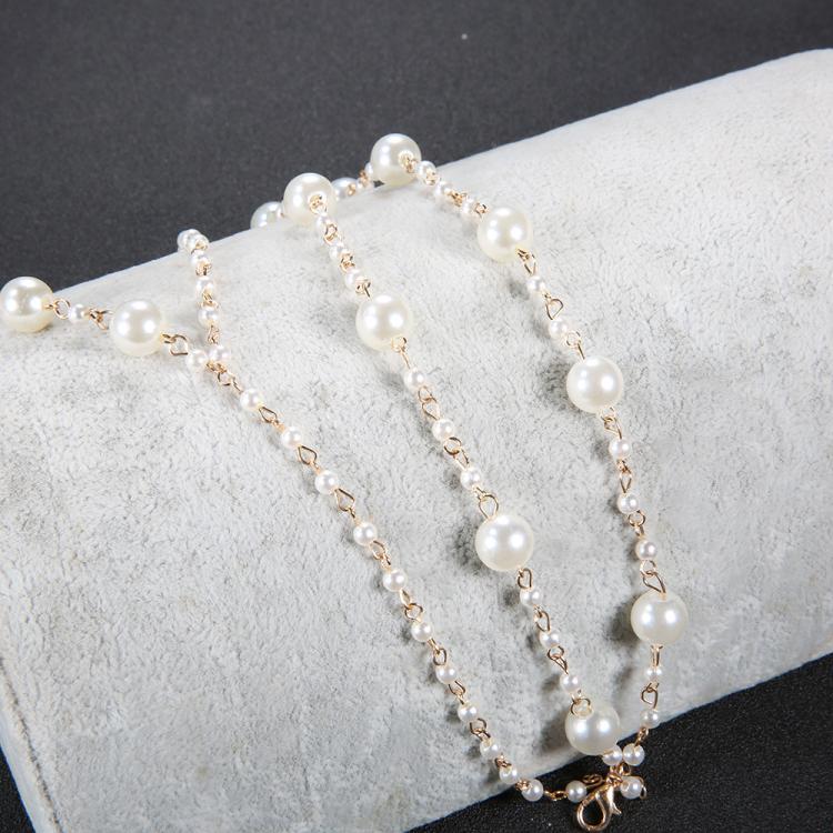 Cavigliera multistrato con perle bianca regolabile