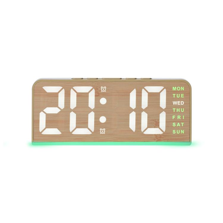Sveglia digitale con retroilluminazione ambientale, visualizzazione di ora, giorno della settimana, data e temperatura.