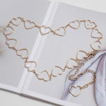 Cintura elegante con catena a cuore in metallo 103 cm