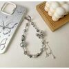 Catena per telefono con farfalla in strass in lega (nera)