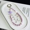 Catena per cellulare con fiocco in vetro e perle (viola)