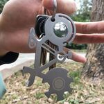 Coltello per carte in acciaio inossidabile con strumento multifunzione per sopravvivenza all'aperto a forma di bicicletta