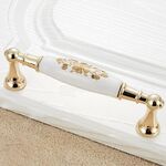 2 PCS 5027-128 Maniglia in ceramica in lega di zinco imitata oro per porta del cassetto dell'armadio, distanza tra i fori: 128 mm
