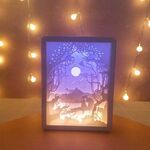 Luce di ritaglio di carta stereoscopica Luce notturna di Natale (amanti sotto la luna)