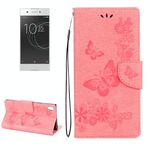 Per Sony Xperia XA1 Custodia in pelle a vibrazione orizzontale con motivo a farfalla a fiori pressati con supporto, slot per schede e portafoglio (rosa)