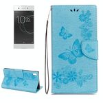 Per Sony Xperia XA1 Custodia in pelle a vibrazione orizzontale con motivo a farfalla a fiori pressati con supporto, slot per schede e portafoglio (blu)