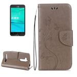 Per ASUS Zenfone Go ZB500KL Custodia in pelle a vibrazione orizzontale con motivo a fiori pressati con supporto, slot per schede e portafoglio (grigio)