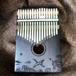 Piano portatile in legno (gru)