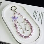 Catena per cellulare con fiocco in vetro e perle (viola)