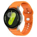 Cinturino in silicone con fibbia inversa cucita a grana ondulata per Samsung Galaxy Watch 7 da 40 mm / 44 mm (arancione)