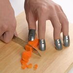 4 pezzi / set regolabile in acciaio inox protezione per le mani protezione per le dita coltello per tagliare le fette strumenti di cottura sicuri