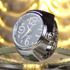 Orologio analogico al quarzo con quadrante 2PCS L04 Orologio con anello al quarzo elastico in acciaio creativo per uomo / donna (nero)