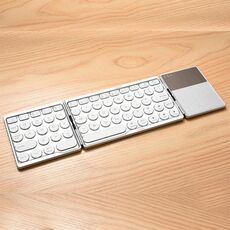 GK408 Tastiera Bluetooth wireless ricaricabile a tre volte con touchpad, supporto Android / iOS / Windows (argento)