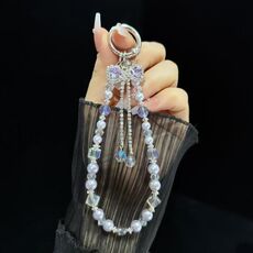 Bracciale con fiocco e nappa (viola)