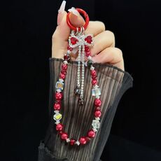 Bracciale con fiocco e nappa (rosso)