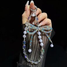 Catena per telefono con fiocco di cristallo e perle di cristallo (viola)