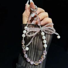 Catena per telefono con fiocco di cristallo e perle di cristallo (rosa)