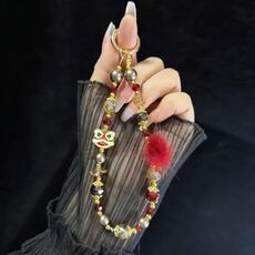 Catena per cellulare con palla di pelo che si risveglia al leone (rossa)