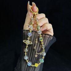 Catena per telefono con perle color stella cosmica (dorata)
