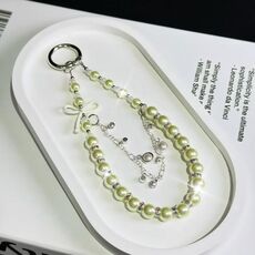 Catena per cellulare con fiocco in vetro e perle (verde)