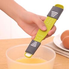 Cucchiaio dosatore da cucina regolabile a nove velocità a doppia testa (verde)