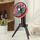 Ventola di ricarica USB da campeggio all'aperto Ventilatore a testa oscillante con luce a LED per treppiede (nero arancione)