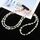 Cordino a tracolla con catena anti-smarrimento per telefono in plastica con diamante e perla (bianco) Cordino a tracolla con catena anti-smarrimento per telefono in plastica con diamante e perla (bianco)