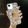 Per iPhone 16e Custodia per telefono PC con strass scintillanti fatti a mano e specchio (quadrato grigio argento) Per iPhone 16e Custodia per telefono PC con strass scintillanti fatti a mano e specchio (quadrato grigio argento)