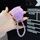 Catena per telefono con ciondolo a forma di palla di pelo (viola)