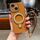 Per iPhone 14 Charm Eye Custodia per telefono con supporto in metallo galvanico con cordino (marrone) Per iPhone 14 Charm Eye Custodia per telefono con supporto in metallo galvanico con cordino (marrone)