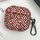 Custodia per auricolari AirPods 3 con texture mimetica e gancio (rosso)
