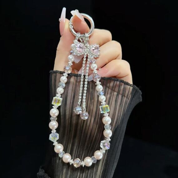 Bracciale con fiocco e nappa (rosa)